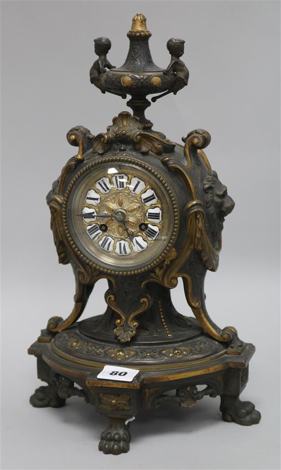 A bronze French mantel clock, 14in.